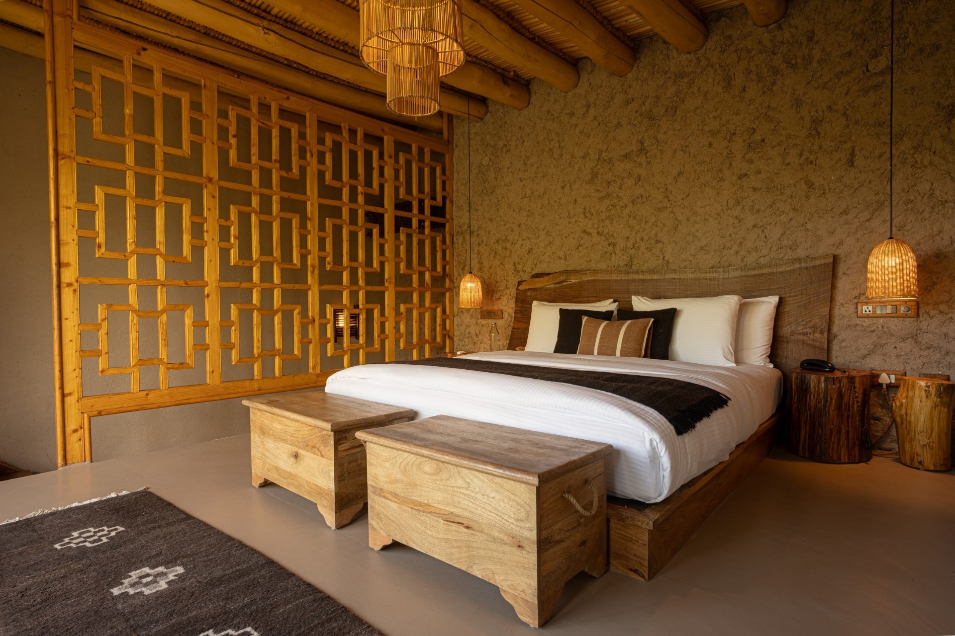 Dolkhar suite with handcrafted wood furniture and natural textures