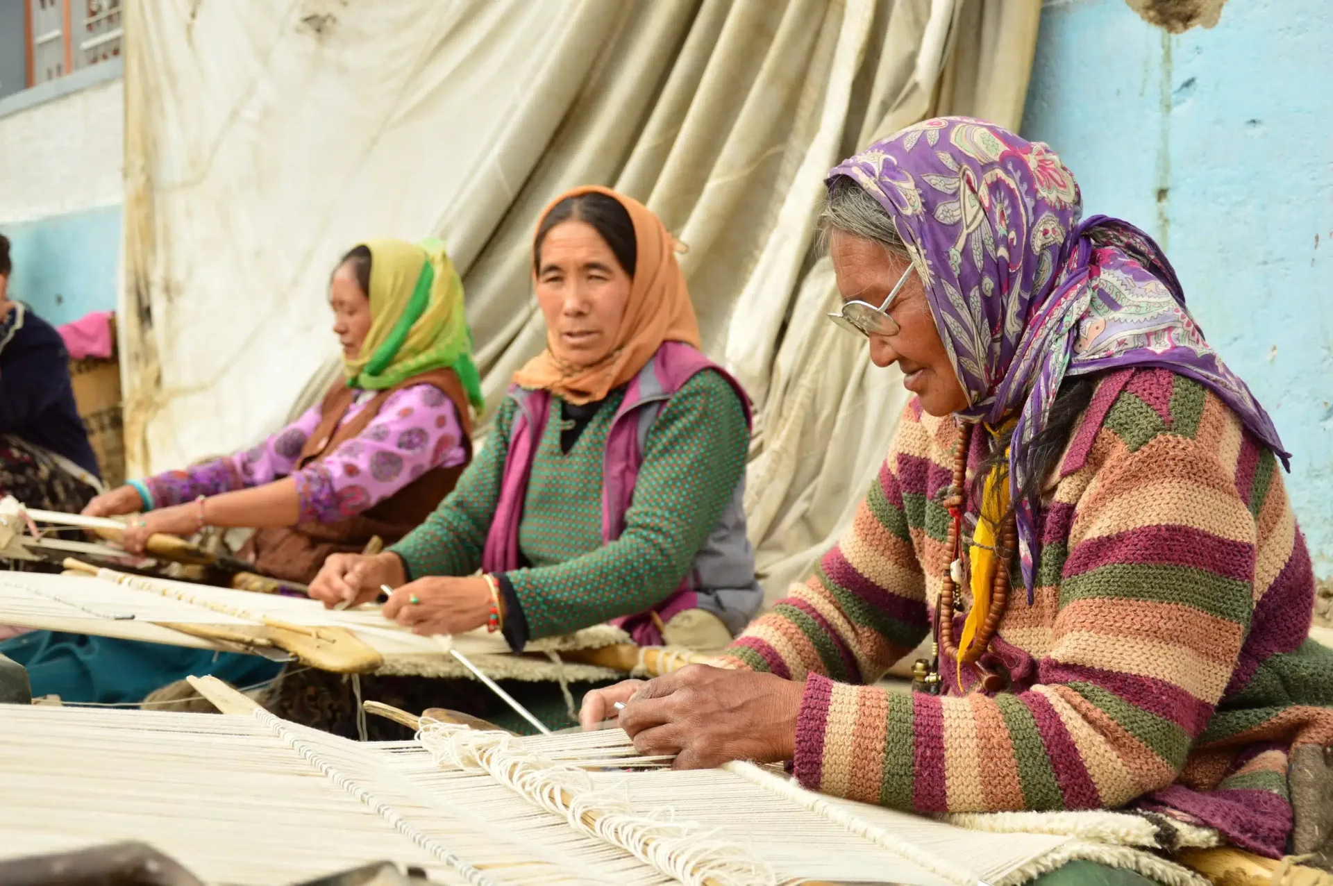 Local artisans weaving traditional textiles in Ladakh