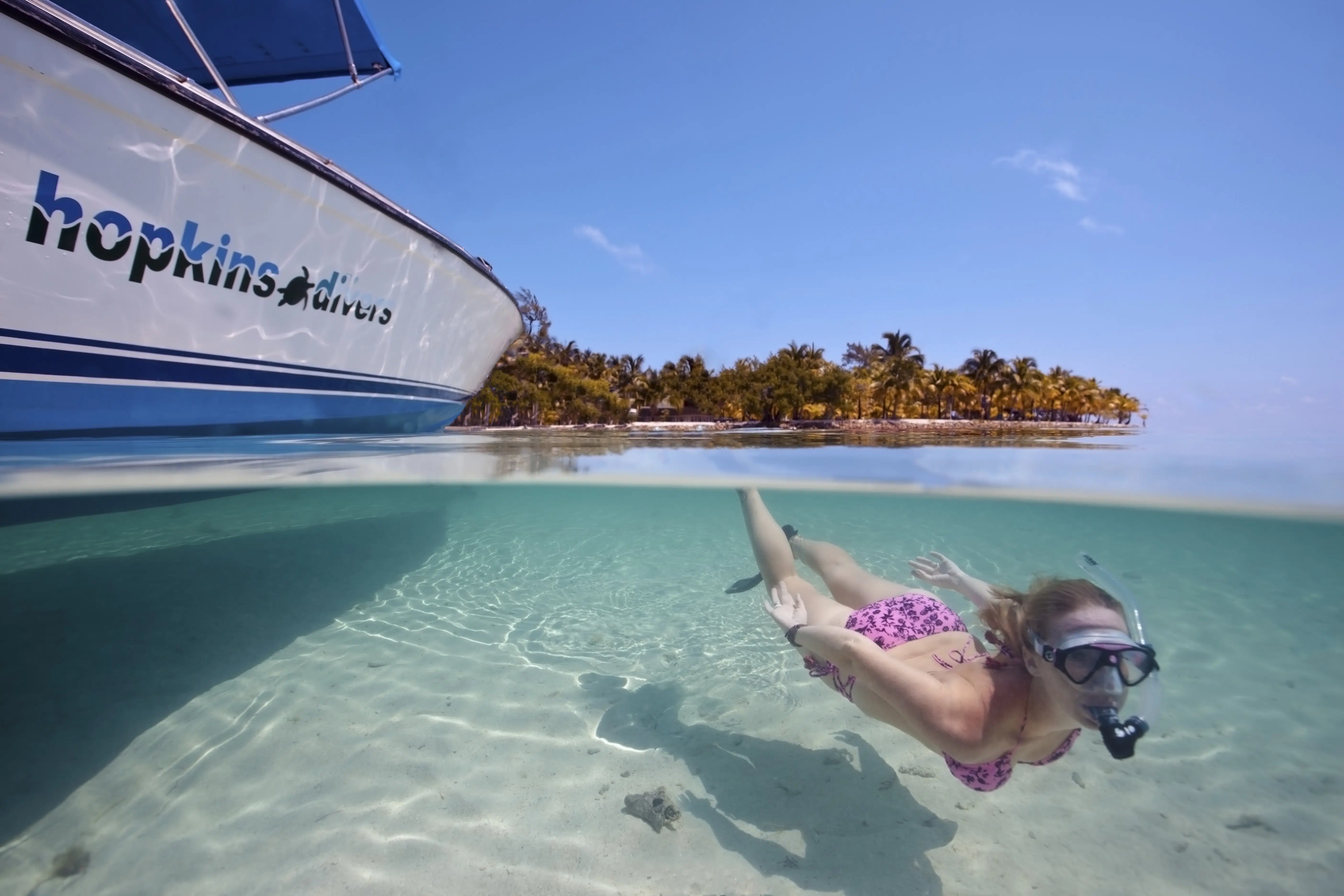 Snorkeling in crystal clear Caribbean waters off Hopkins