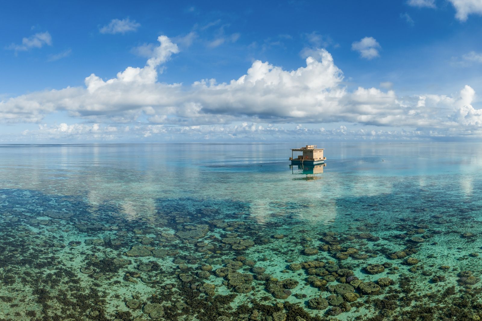 The Manta Resort floating room amid coral reefs