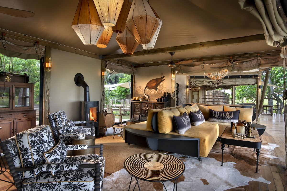 Safari lounge with designer furnishings and fireplace